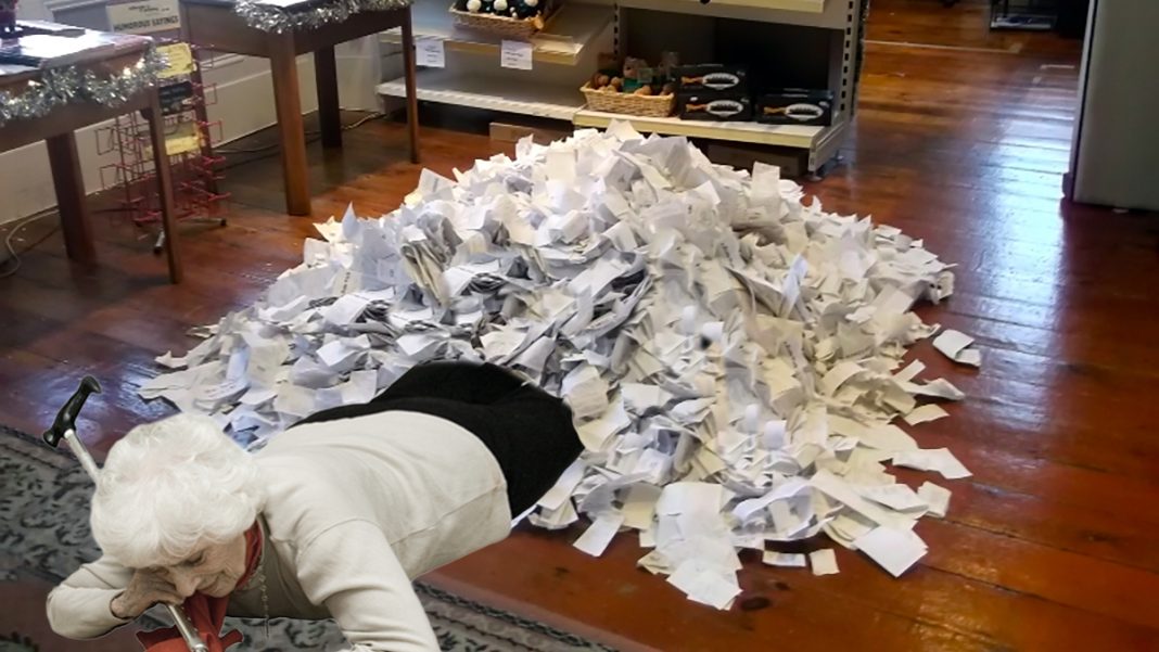 Authorities allowed Millie Franks to keep her receipt pile shown here in her home.