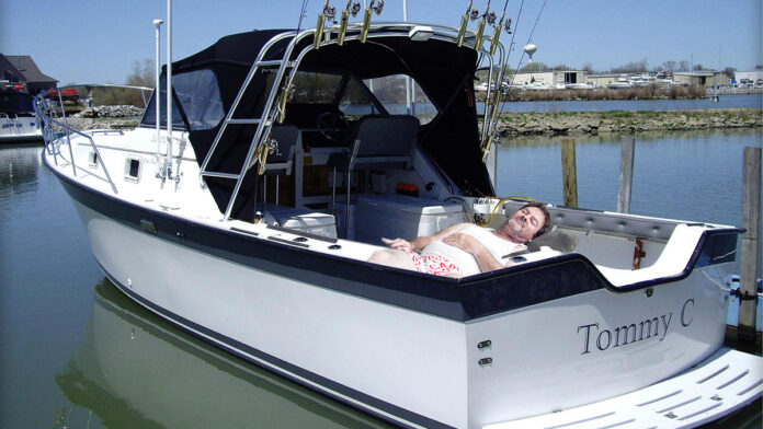 Cedar Ridge Resident seen here in his boat the Tommy C docked in the Sacramento Delta.